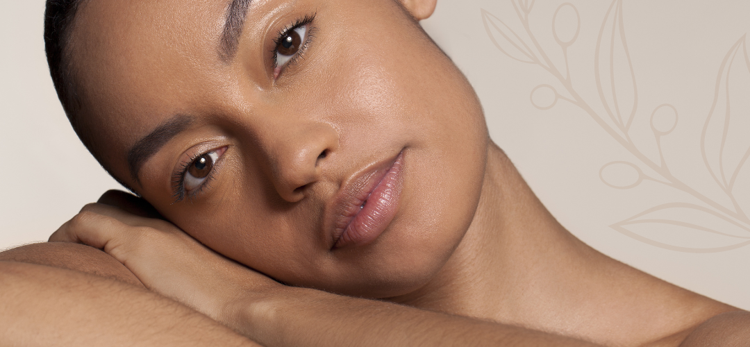 Woman with glowing skin after aesthetic treatment